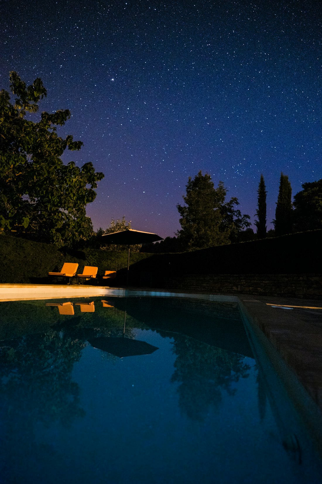 Pool and outdoor lighting at night