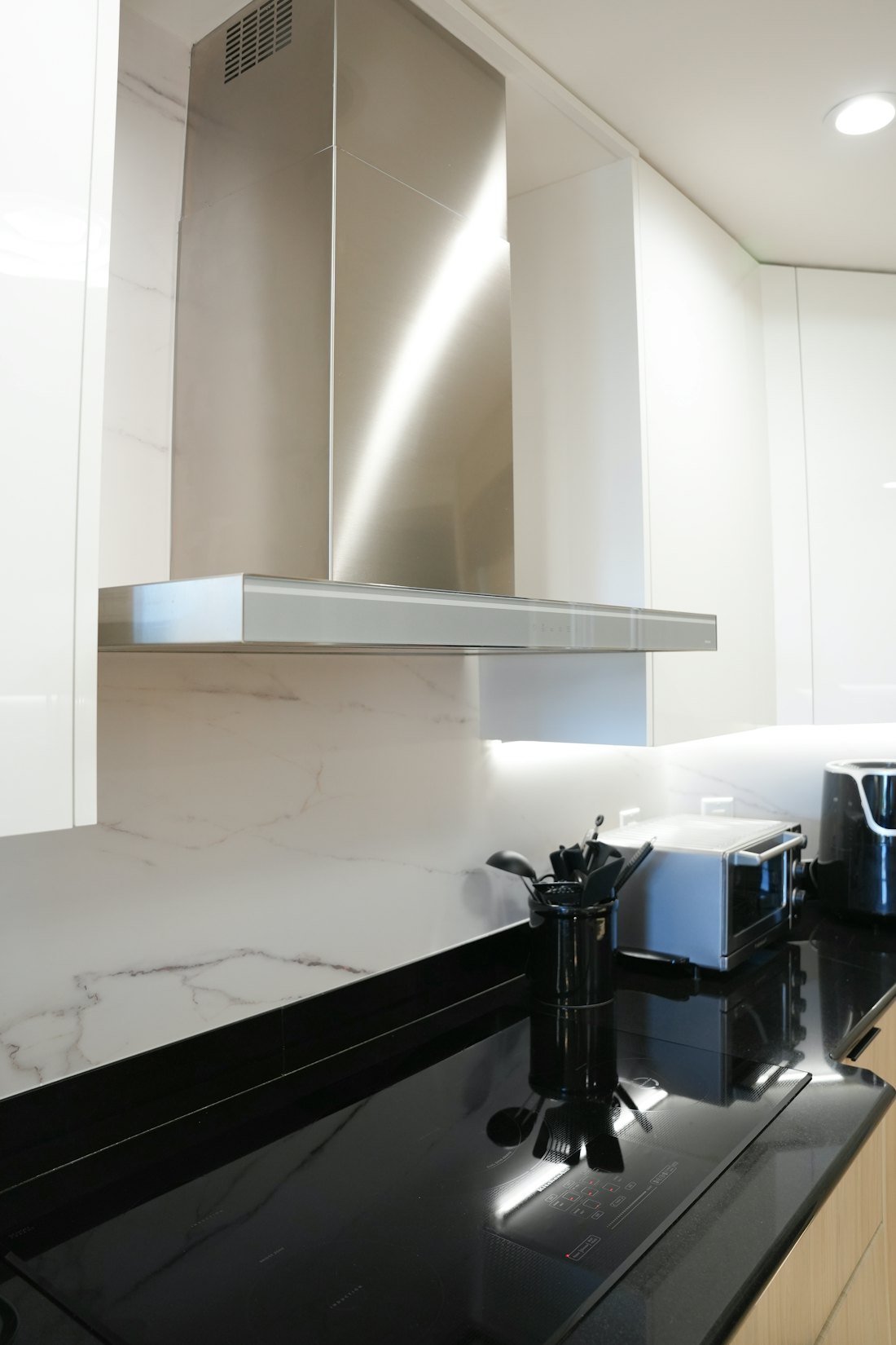 Range hood over a cooktop